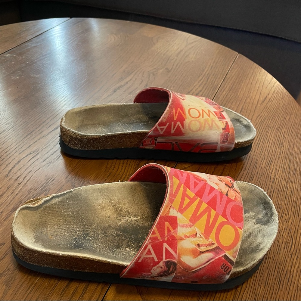 Vintage Birkenstock “Birkis” with vintage pin-up images on the sandal. US: 9